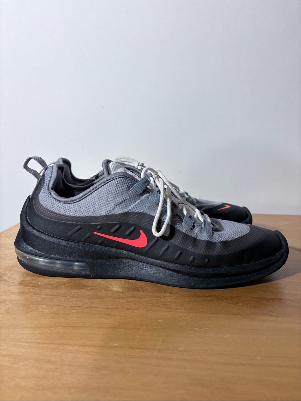 Nike Men’s Gray & Black Sneakers with Red Swoosh Accent